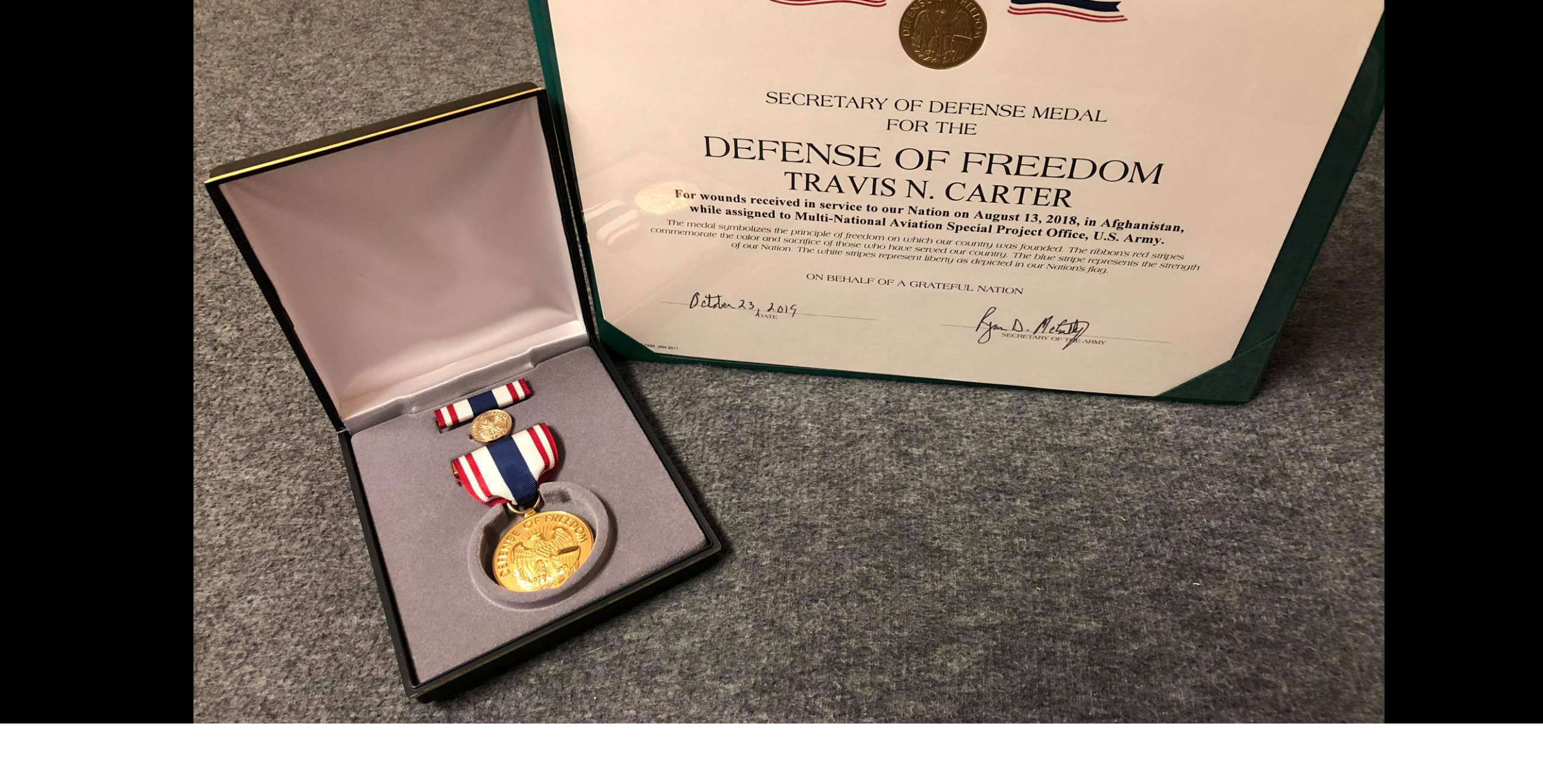 Travis Carter Defense of Freedom Medal square